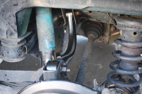From this angle, it looks like the arm might touch the CV axle.  Trust me, it clears.  Not a lot of extra space, but there is enough.