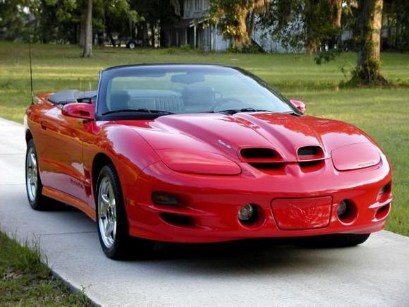 2000 Pontiac Trans Am WS6 
with Borla Exhaust,Koni shocks, SLP air.
Fast car for young racer. 
My kidneys could not take the beating.