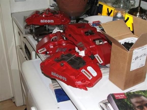 Alcon 6 pot and 4 pot calipers ceramic pads 355mm rotors and hats, race spec' system that replaces the Brembo system. The Alcon rears are as big as the Brembo fronts...I expect better brakes