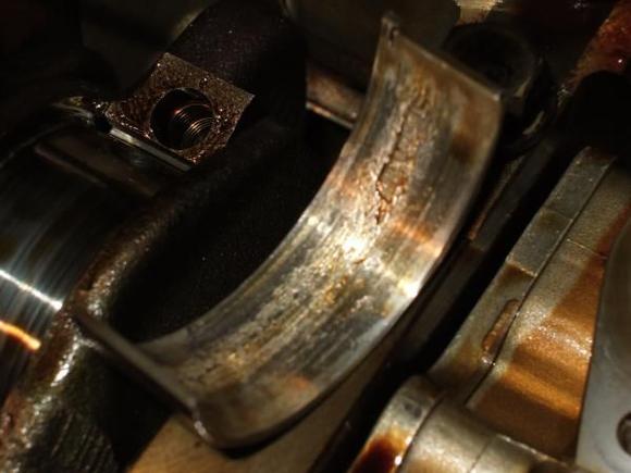 Debris from spun bearing in rear of motor working it's destruction on the other bearings.