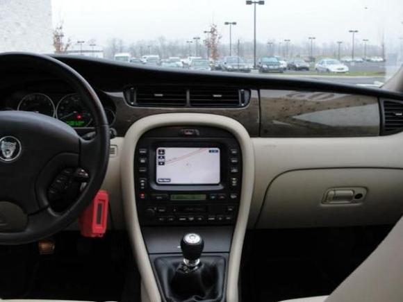 Interior.  A good friend of mine says automatics are for people with one leg!  Joking aside, a manual is the only way to go for me.