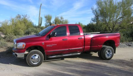 Dodge 3500 Big Horn Edition, Quad Cab dually, nerf bars, class 5 double hitch, electronic fuel modulator, 3 way power chip, Air Raid intake system, 4 inch exhaust, Pac Brake exhaust brake, 5000 lb Firestone airbags, bed liner and pad, Michelin tires.
