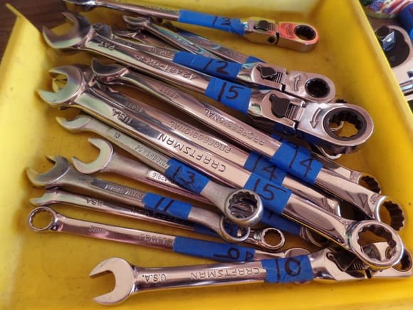 Labeling the wrenches and sockets makes it much easier to select the right size when your cricking your neck and squinting through dirty reading glasses.