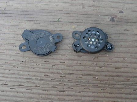 This is a front and back view of the beeper- speaker for the parking assist.