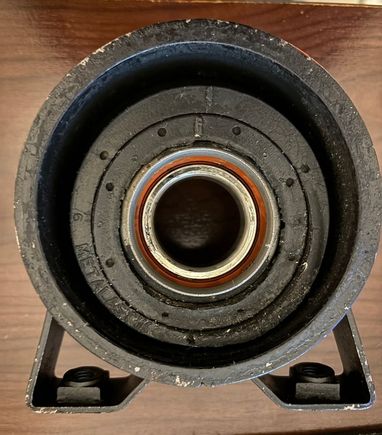 Other side of old center bearing showing the rubber drooping down towards the nut side.