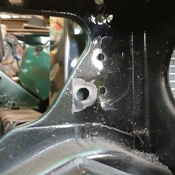 To give you an ider on how much wider this is, the 3 holes you see going down are what the headlight relays were mounted to, and you can clearly see the radiator protruding past the headlight opening. Hopefully I don't need to change the headlight mount to accomadate this.