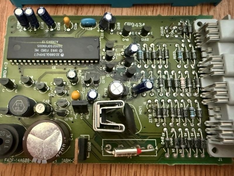 my original...i did replace the thermal fuse here...but notice the black discoloration in middel of the board. I beleive this is more damage.