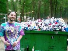 lol my friend at a hippy festival. LOVE YOUR MOTHER!!! should have seen the lookso n the hippies faces when we asked htem to help us put all this in the recycling bin.