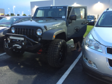 Picking up my new jk. Only time my wife gets near the driver side. Lol