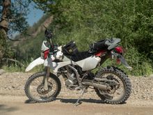 I replaced the 2007 with this 2009, pictured here on Colorado’s Alpine Loop in 2018. I hate the red. Been looking for plastics forever. I took off the stickers and plasti-dipped most of it white. Looked pretty cool for a while, but couldn’t hold up to a couple days on the trail. I had to peel it all and now we’re back to red with no stickers. Gotta make a change!