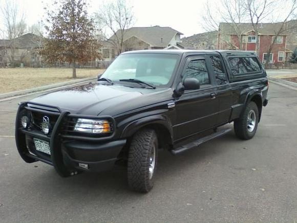 It didn't come with the off-road package, however the previous owner added the round tubular side rails.
