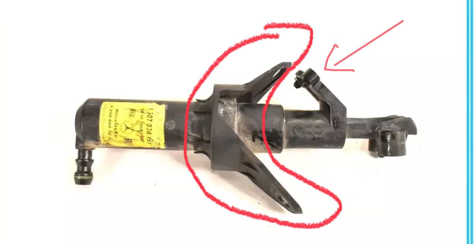 The circled area is the V-shaped bracket that stabilizes the unit. It slides off easily. The arrow is pointing to an area that I suspect might have a bolt or bolts. It appears to be a blind approach so I�m not sure how to access it short of taking the bumper off.