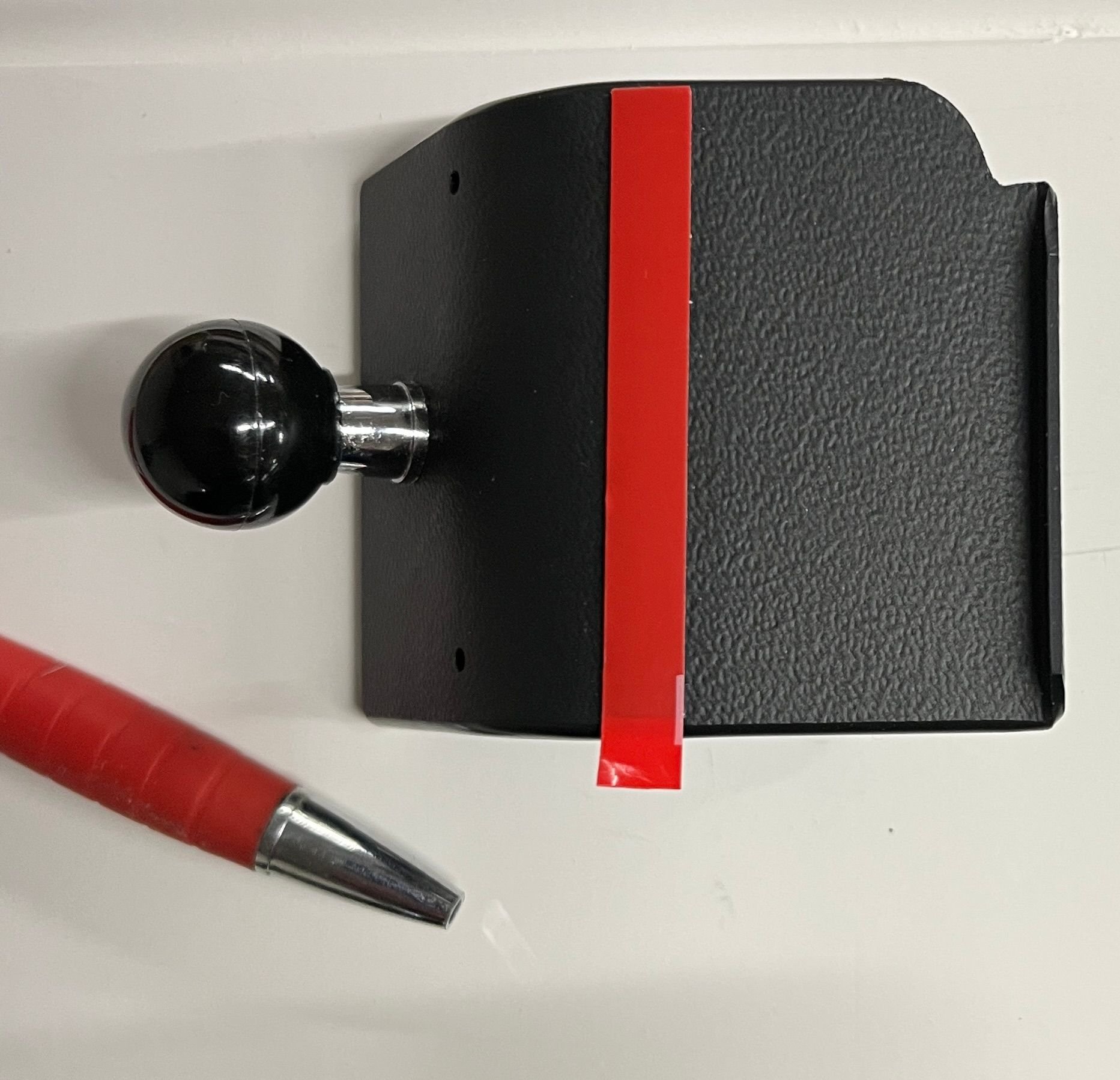 855814 mount with top corner modified to fit W214 vent. Double-sided tape moved to opposite edge. 6mm spacer replaced with modified ballpoint pen tip to increase travel of MagSafe mount.