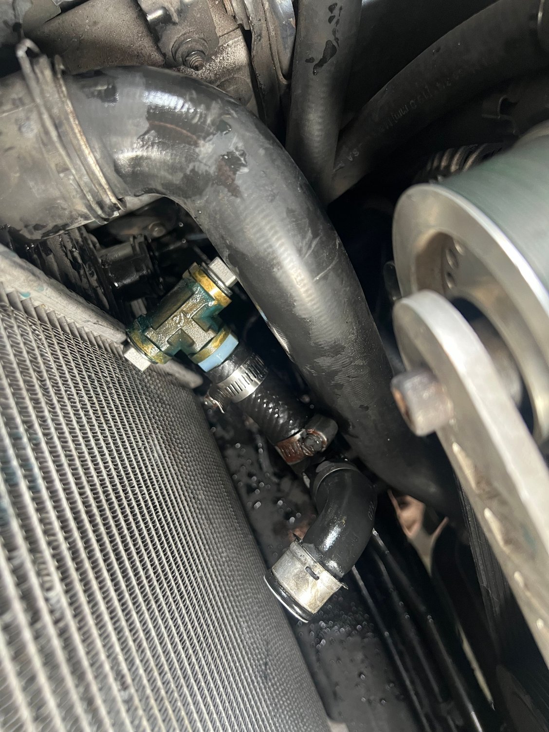 Want to eliminate this �mod� from the previous owner. Coolant has been leaking from it. I�m replacing the radiator this weekend and wanted to take that brass fitting out. Pretty sure someone here has a better option that what was done.