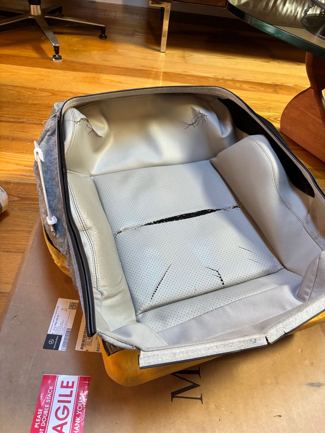 Removing the damaged cover.