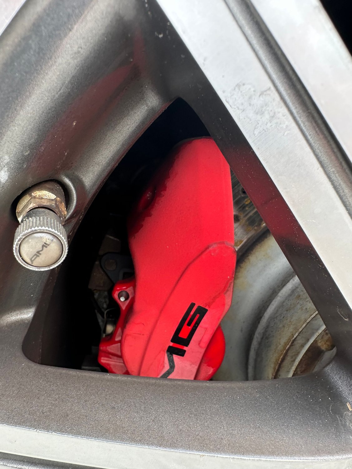 Rear passenger. General conditions of what the front brakes looked like too, before the clear.