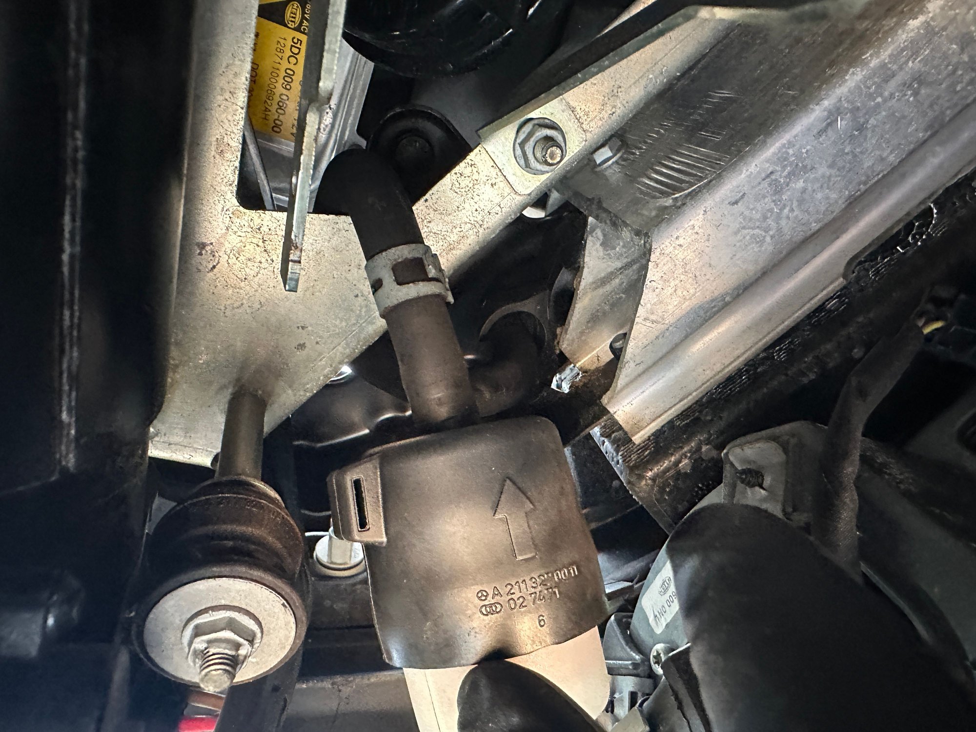 Top spring clamp loosened and moved off of the Airmatic air filter nipple.
