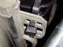 Upper radiator to A/C mounting tabs