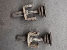 Radiator retaining pin and clamp