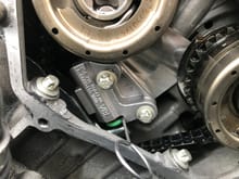 The orientation and shape of this tensioner is different than the passenger side.  Remember the engine must be at 40 past tdc.  It WILL NOT install otherwise.