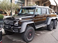 Supercars from Qatar are arriving today! Here's an awesome Mercedes-Benz G63 AMG 6x6 at the Four Seasons Hotel De Bergues in Geneva, Switzerland. You could also see the Matte White Ferrari LaFerrari behind it, it's also from Qatar.