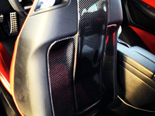 Carbon Fiber backseat cover to go with 2 tone red and black seats.