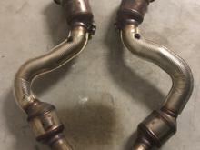 Factory downpipes fitted with primary and secondary cats