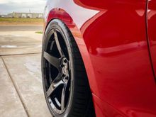 Commonly referred to as "Wheel gap" is gone as a result of lowering the vehicle.  Not so much cuz the wheel offset is low (in this case it is {low offset wheel for the application}, first picture I found on the web)