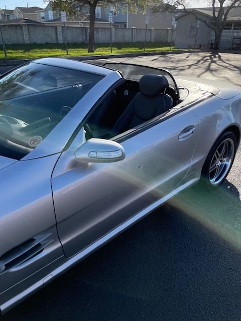 2004 Mercedes-Benz SL500 - A very nice maintained Sl500 - Used - VIN WDBSK 75FX4 F07 6 - 65,000 Miles - 8 cyl - 2WD - Automatic - Convertible - Silver - Melbourne, FL 32903, United States