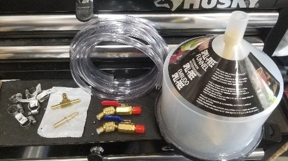 Funnel, Valves, hose and connectors.  Note: I ended up using slightly heavier hosing as the thin stuff in the picture tended to collapse uder pressure. 