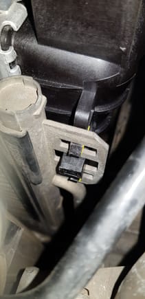 Upper radiator to A/C mounting tabs