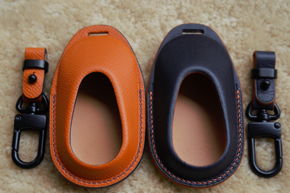 The product is handcrafted to each customer's specifications, using premium genuine leather and offering over 60 leather and thread colors. Names, initials, logos, or message content are customized upon request by Leather Swift, available at https://leatherswift.com/shop/ (front)