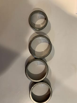 Three large bearings and one small instead of two large and two small.