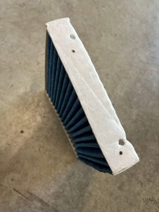 Holes in top edge of under glovebox cabin filter.