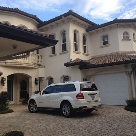 My GL in front of my home in Florida