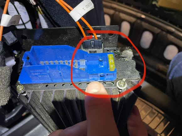 i ultimately decided to just remove/grind down that blue plastic divider in the sedan amp which allowed it to fit in wagon connector with the tab that was supposted to plug into the slot with no divider in the wagon pink amp