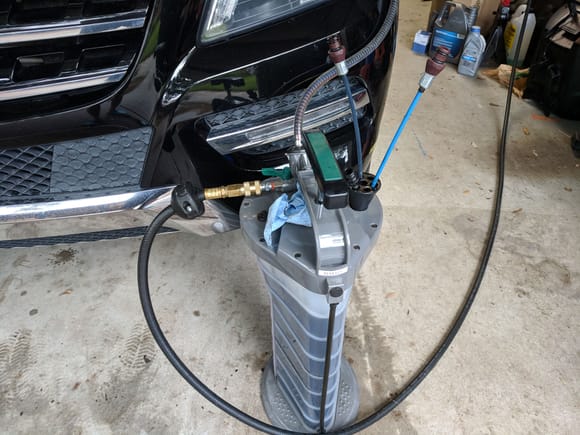 Oil extractor. Black air hose connects to my air compressor.