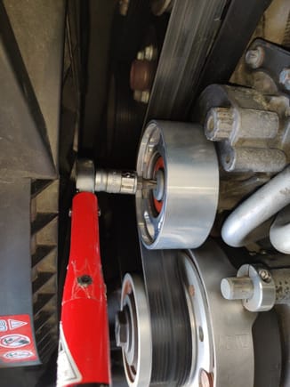 This fits easily into both the supercharger tensioner pulley bolt AND the double idler pulley bolt without removing the radiator fan assembly.
