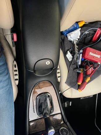 New centre console installed. Old one had the 2 buttons that were a pretty crap design. shipped from the UK. much better functionality on this one opens to the side for the top compartment and upwards for the bottom compartment. also no scrapes on this one. easy  install.