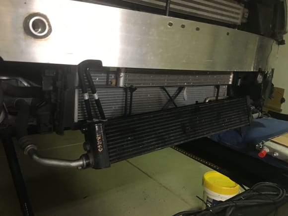 You need to remove the plastic ducting around the oil cooler to mount to the intercooler radiator.  Will finish up next weekend!