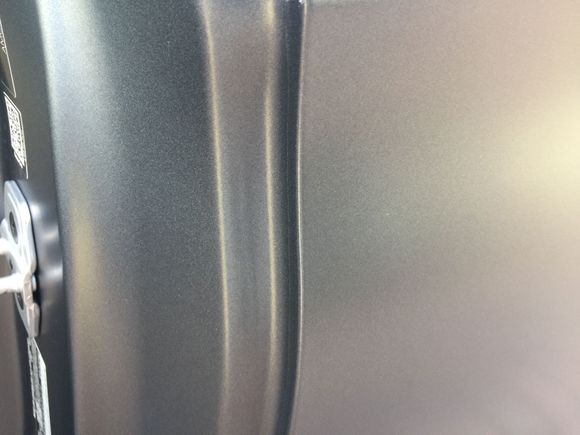 If you look closely, the left side is inside the door jam with no ppf, while the right side is the body with the film on. No difference in my opinion.