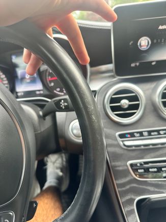 Pretty bummed about this, its on the top of the steering wheel just rotated it to the side so you could see it without glare. Is there anything that I can do? I already tried cleaning it with leather cleaner and it doesnt help. I ordered a black leather recoloring balm on amazon and im hoping that will do the trick?