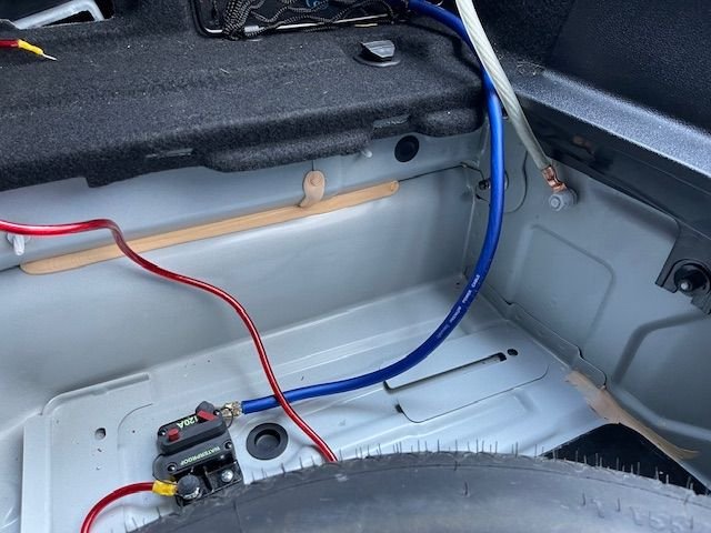 I was very happy to find that unused factory ground point on the passenger side of the trunk! I assume this would be the battery ground point in versions with the rear battery. 