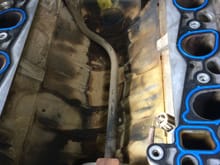 Tube running from water pump to back of engine