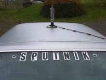 shot of my back hatch with &quot;SPUTNIK&quot; written on it. it is called SPUTNIK bc it is and ugly 2 tone car with a giant antenna on top