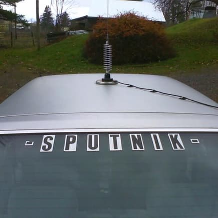 shot of my back hatch with &quot;SPUTNIK&quot; written on it. it is called SPUTNIK bc it is and ugly 2 tone car with a giant antenna on top