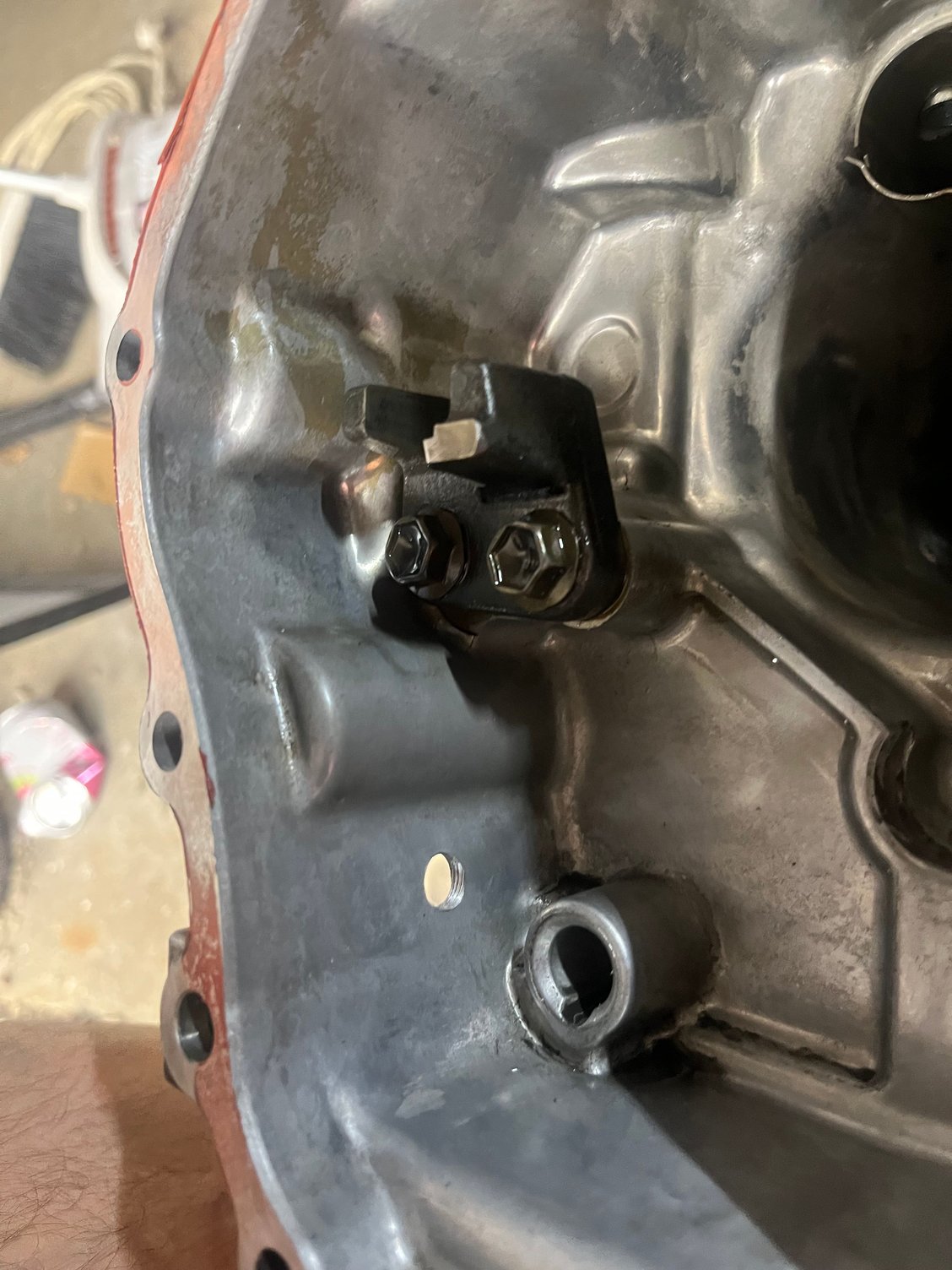 Here’s where the hole ends up inside the case, above the boss for the sixth gear shift rod, if that’s what this is.