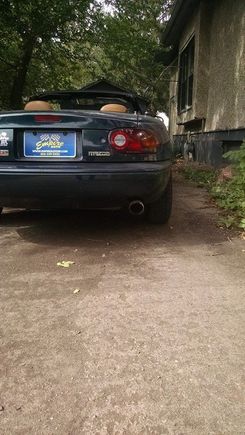 Shitty image of the back of my car.  Can't see the exhaust but whatever it's artsy.