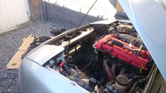 This is how it's sitting right now, nipple on the water pump thing on the right broke so I need to replace that, and the coolant lines because I had to cut them loose.