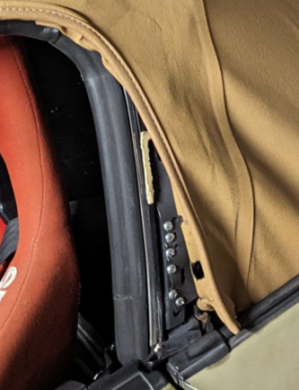 6 screws to hold the fabric there, just like the factory service manual calls for.